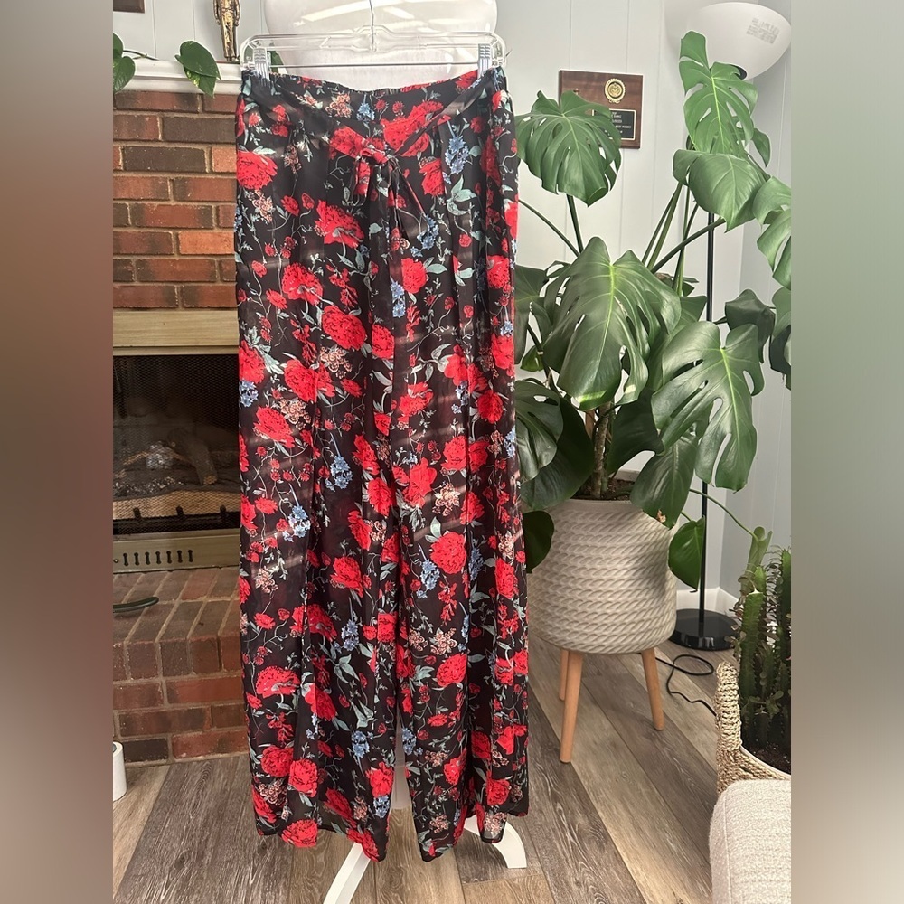 #6)  Open leg pants with shorts underneath and  belt excellent condition.
